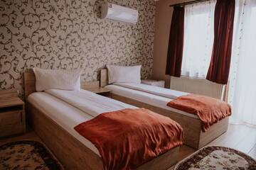 Фото номера Двухместный номер с 1 кроватью или 2 отдельными кроватями Отель Hotel-Restaurant Milenium г. Salonta 22