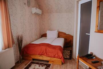 Фото номера Двухместный номер с 1 кроватью или 2 отдельными кроватями Отель Hotel-Restaurant Milenium г. Salonta 7